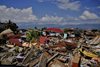 Widespread destruction in Balaroa, Indonesia. Photo by  Xavo Kairo